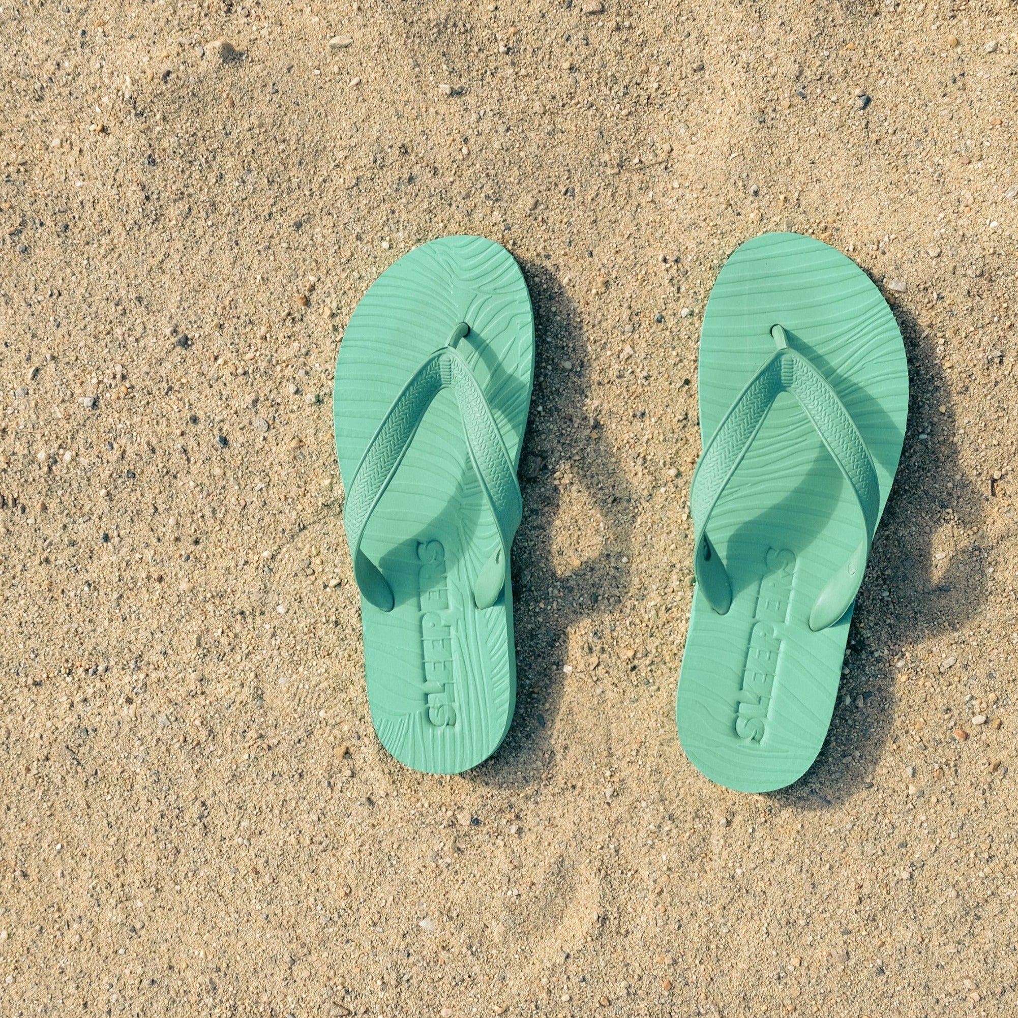 emerald green flip flops